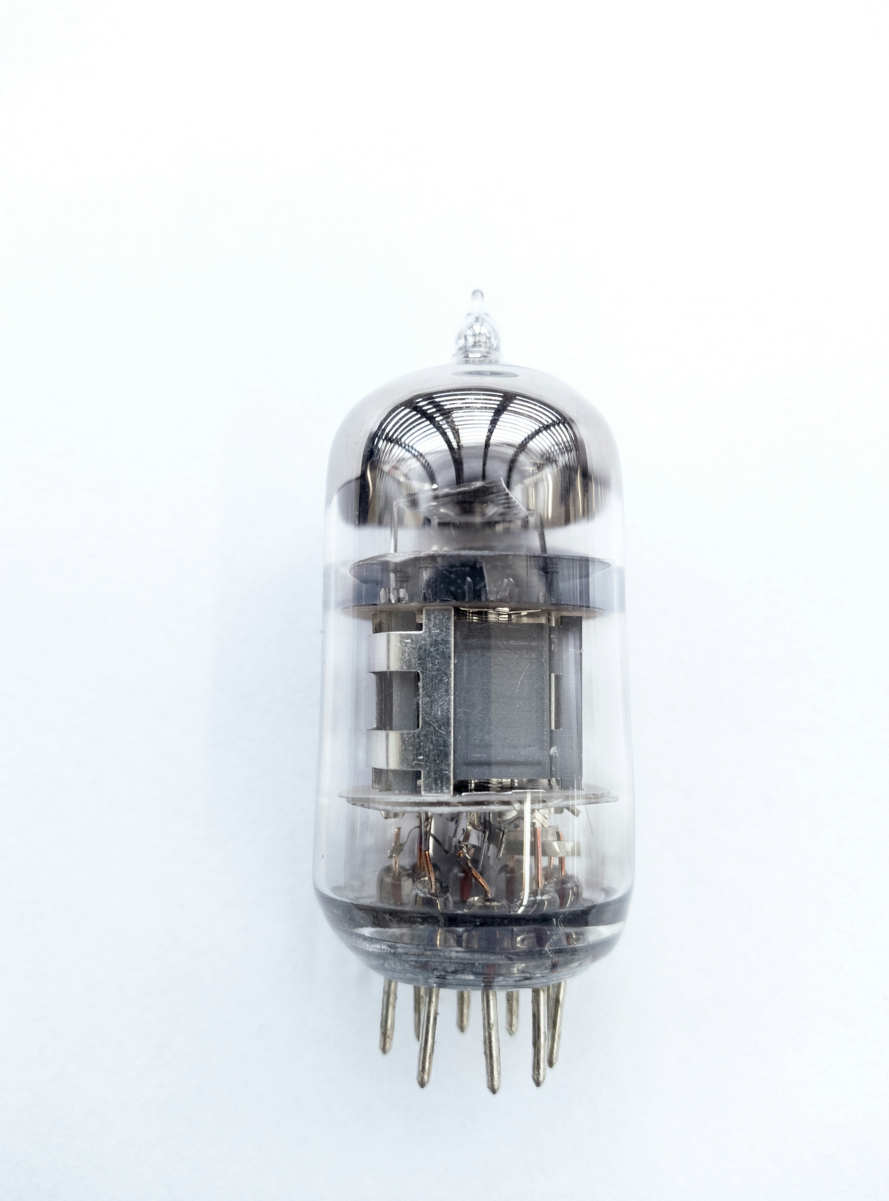 Electronic Components - close-up of a vacuum tube showing internal wiring and glass structure.