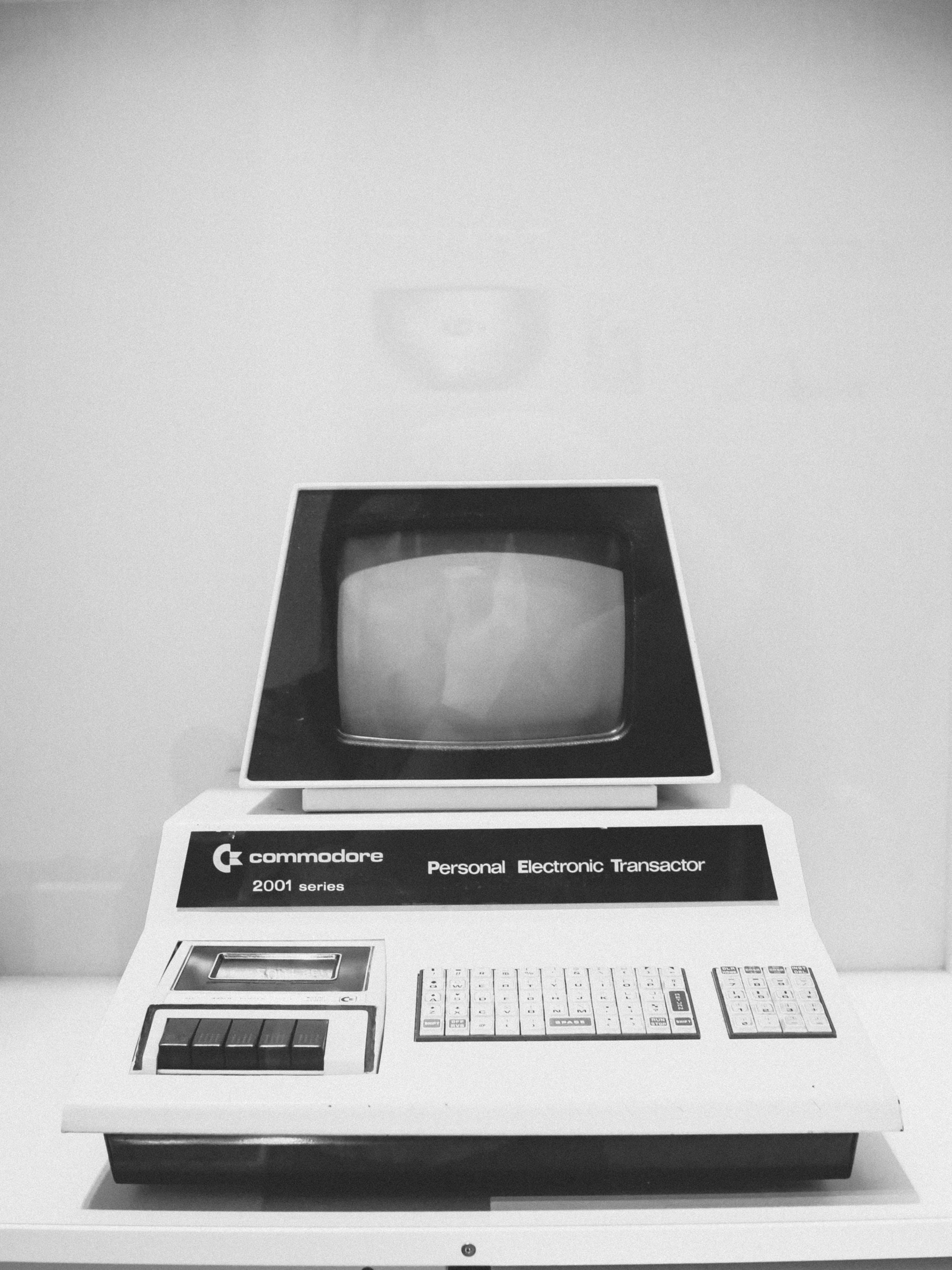 Vintage Commodore PC Parts with keyboard and monitor, showcasing early personal computing technology.