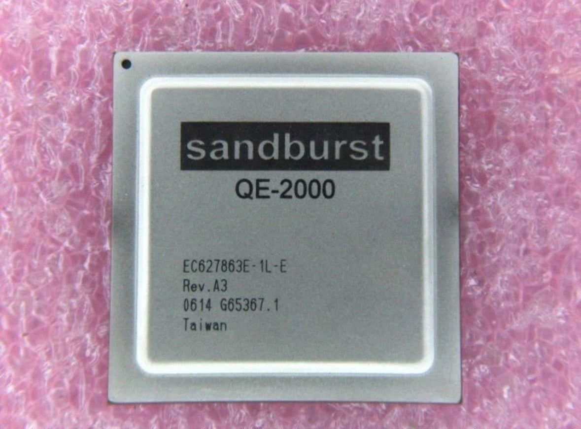 New Broadcom QE2000-R Sandburst Packet Routing Engine IC | QE-2000 BGA on pink foam background.