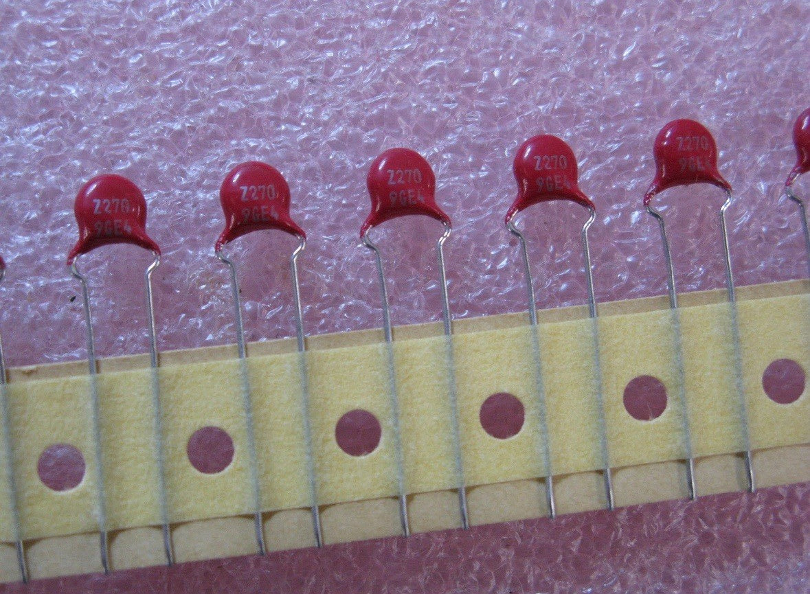 10 QTY Littelfuse V270ZT05 ZA Series 5mm Metal Oxide Varistor (MOV) - 270V 400A on a yellow strip