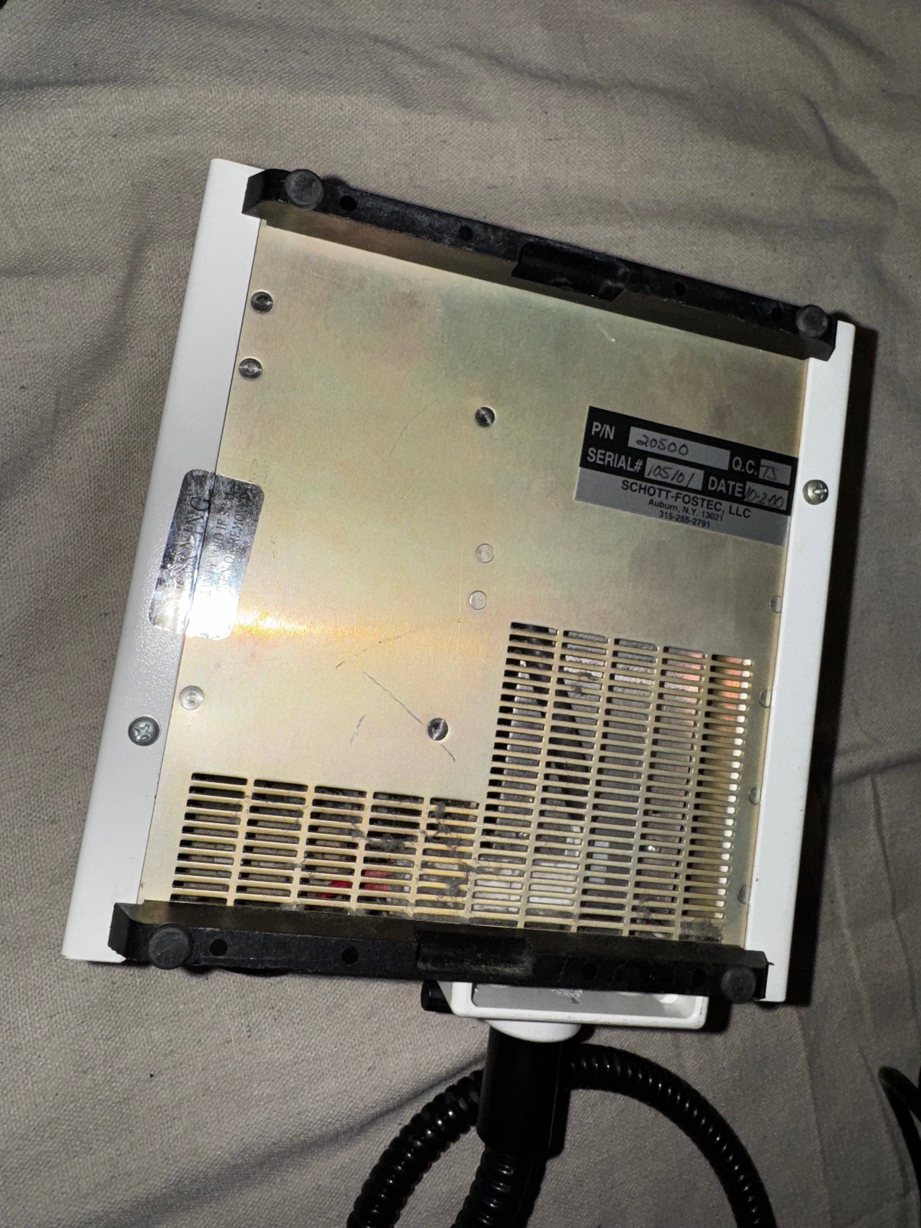 Schott Fostec Ace - 20500 Fiber Optic Light Sources showing the back panel, including serial and date information.
