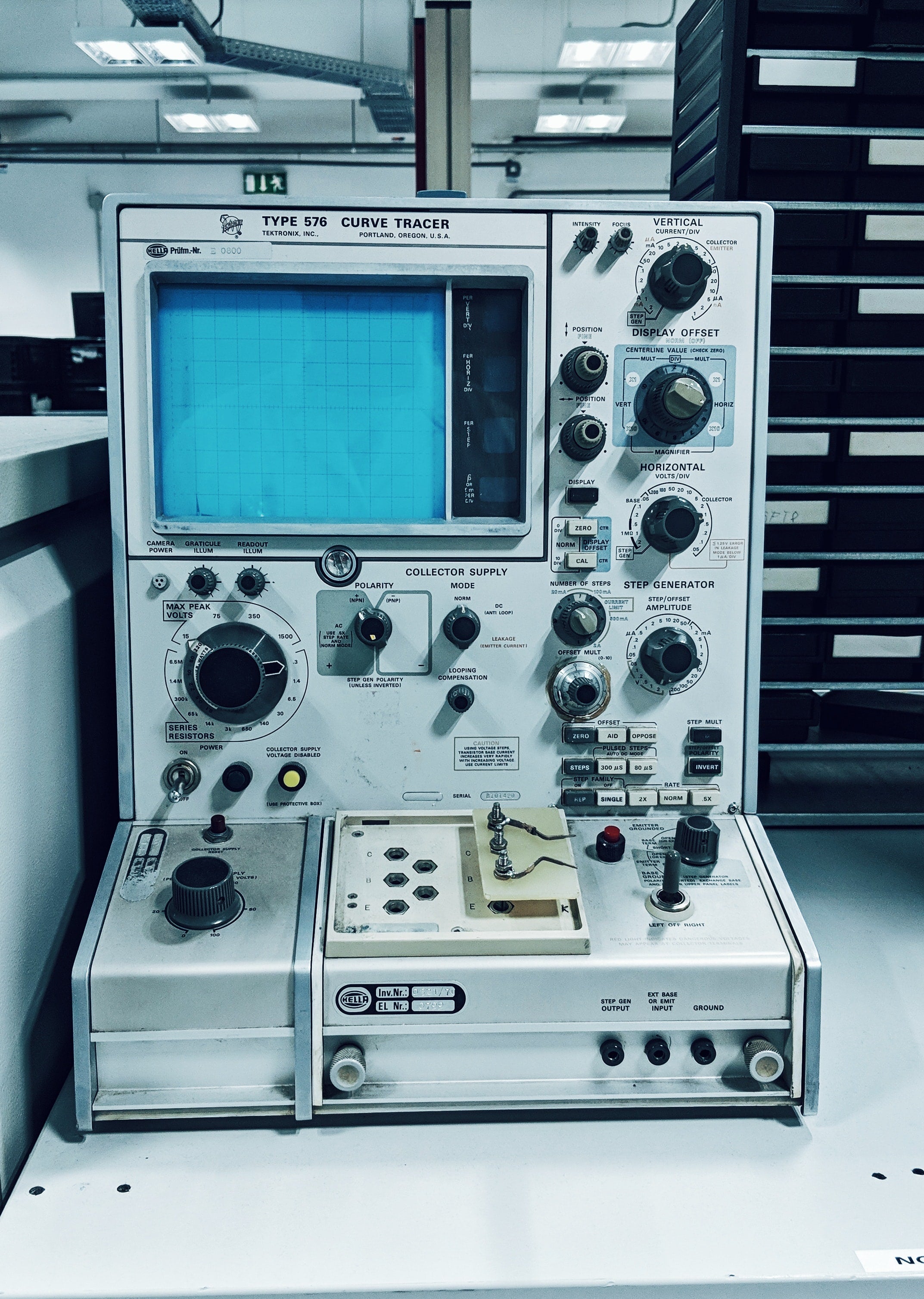 Test Equipment for analyzing electrical components with display and control knobs.