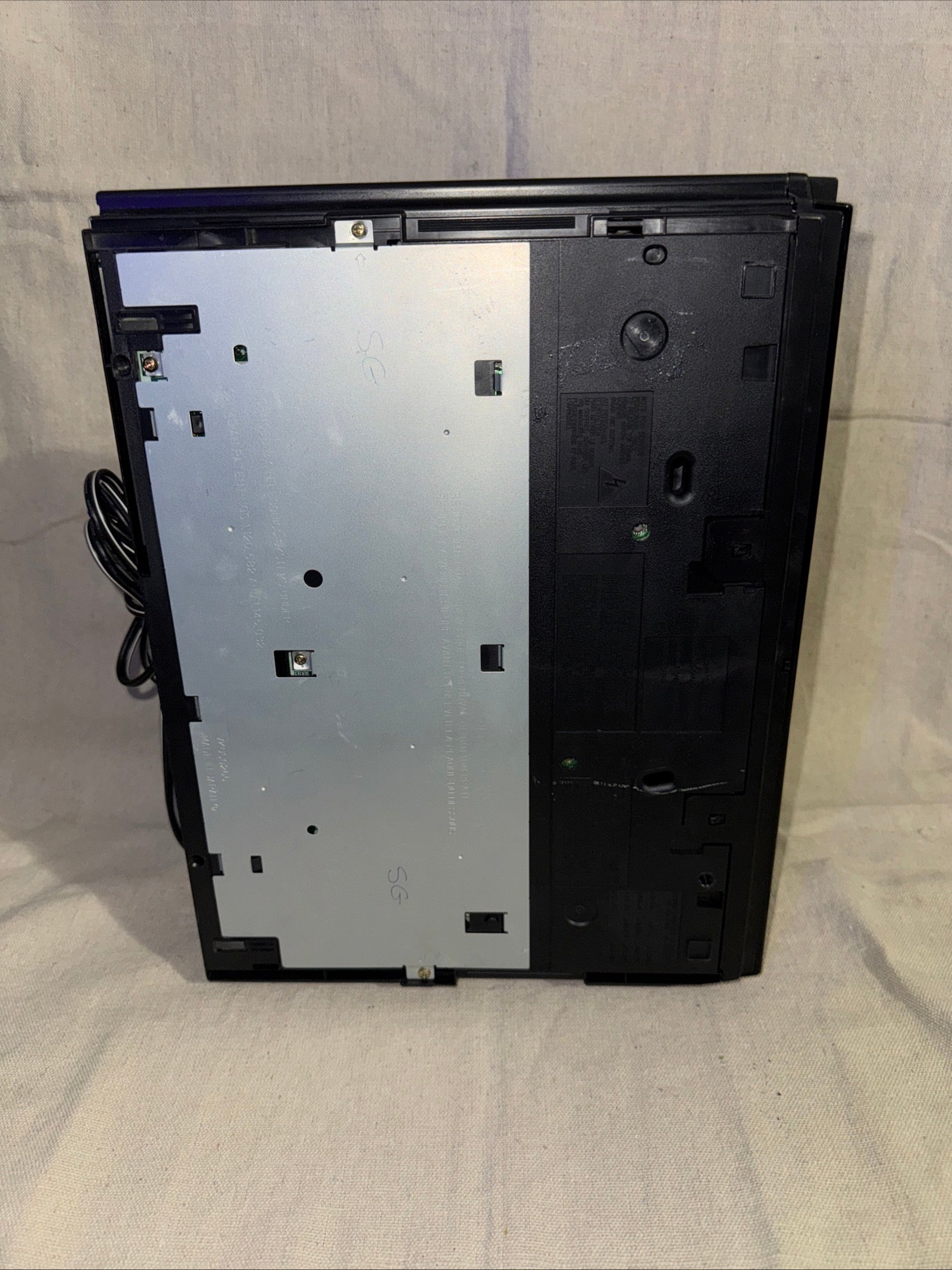 Serviced RCA VR606HF VCR VHS Recorder Player shown from the back with visible connections and metal plate.