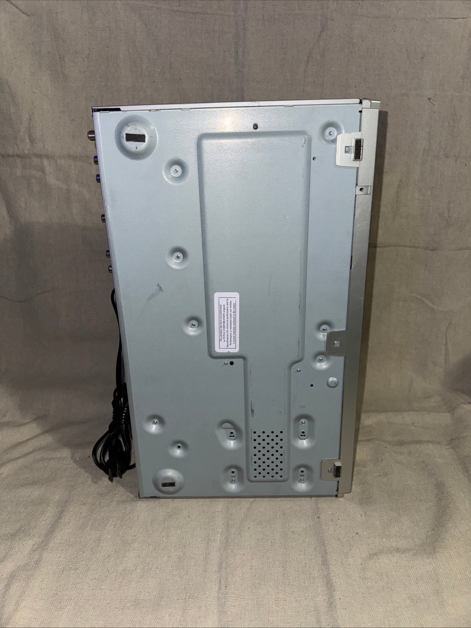 Serviced Magnavox MWR 20V6 back view with connections and powered off.