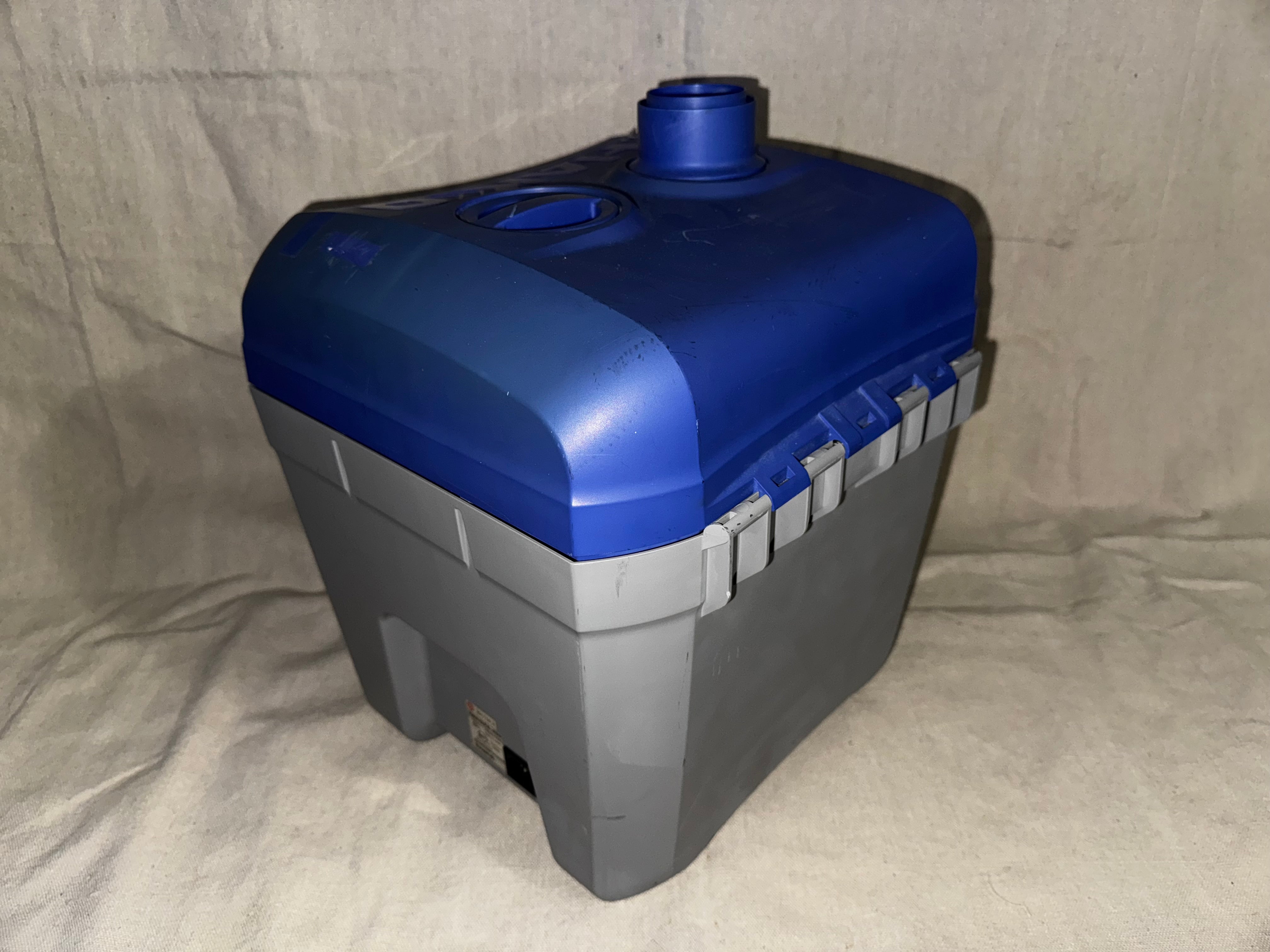 Hakko FA-430 Soldering Fume Extractor in blue and gray color design, showcasing its compact features.