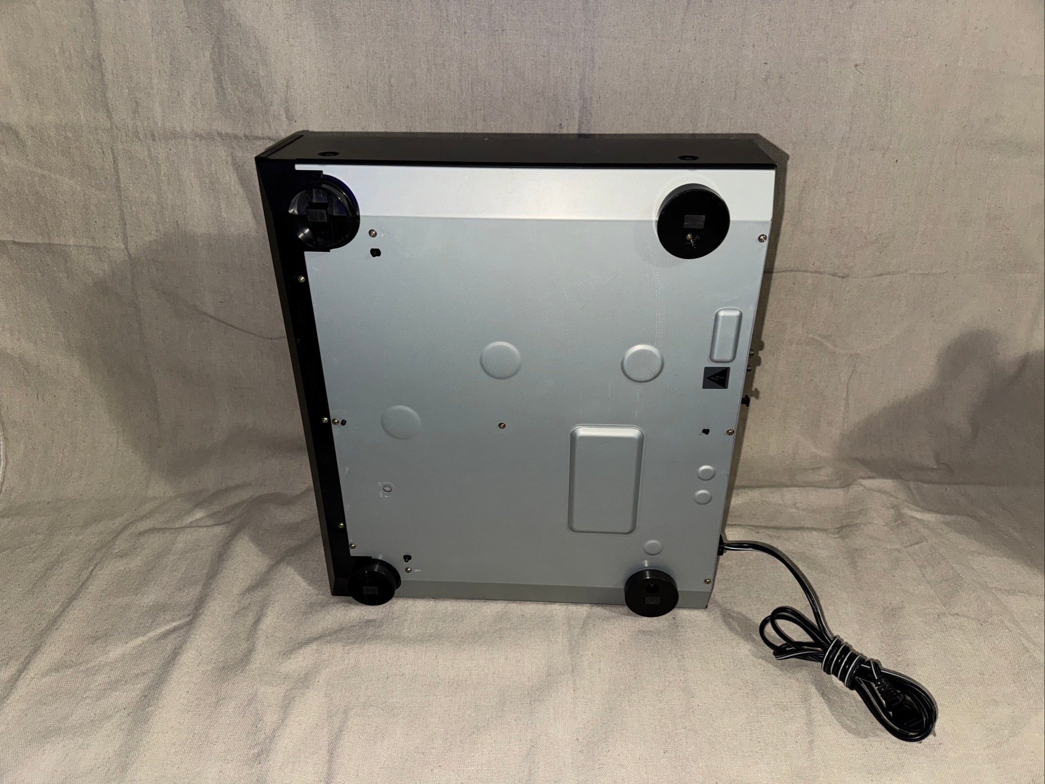 Back view of a serviced Sony CDP-CE525 showing connections and features, ready for use.