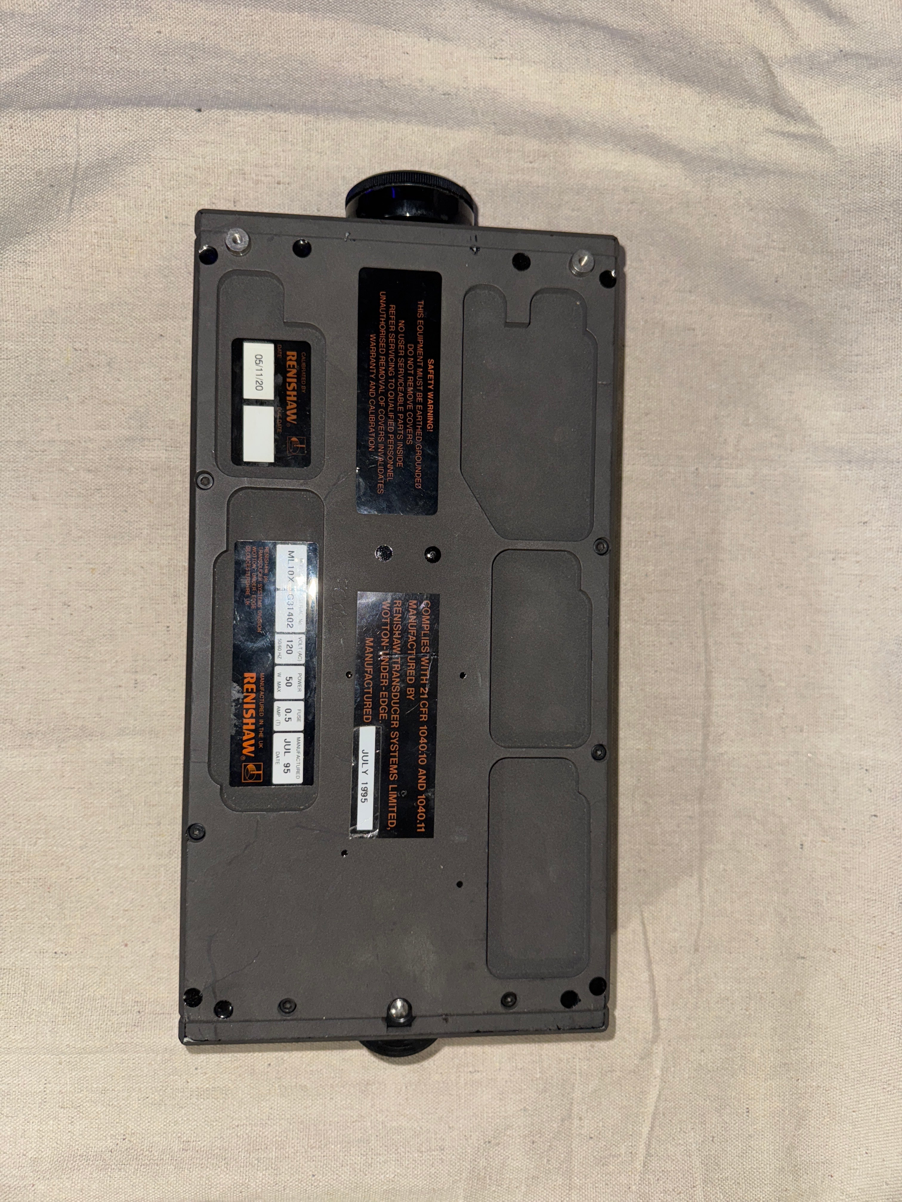 Renishaw ML10 X Laser Interferometer top view showing functional testing controls and markings.