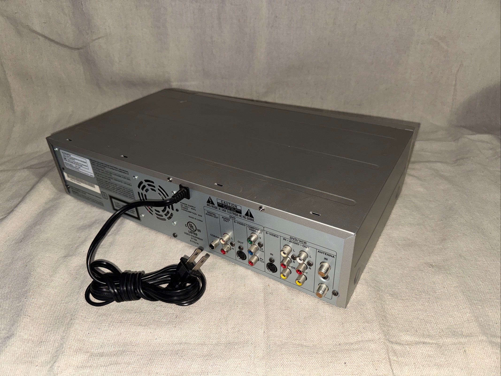 Serviced Magnavox MWR 20V6 back view showing connections and power cord.