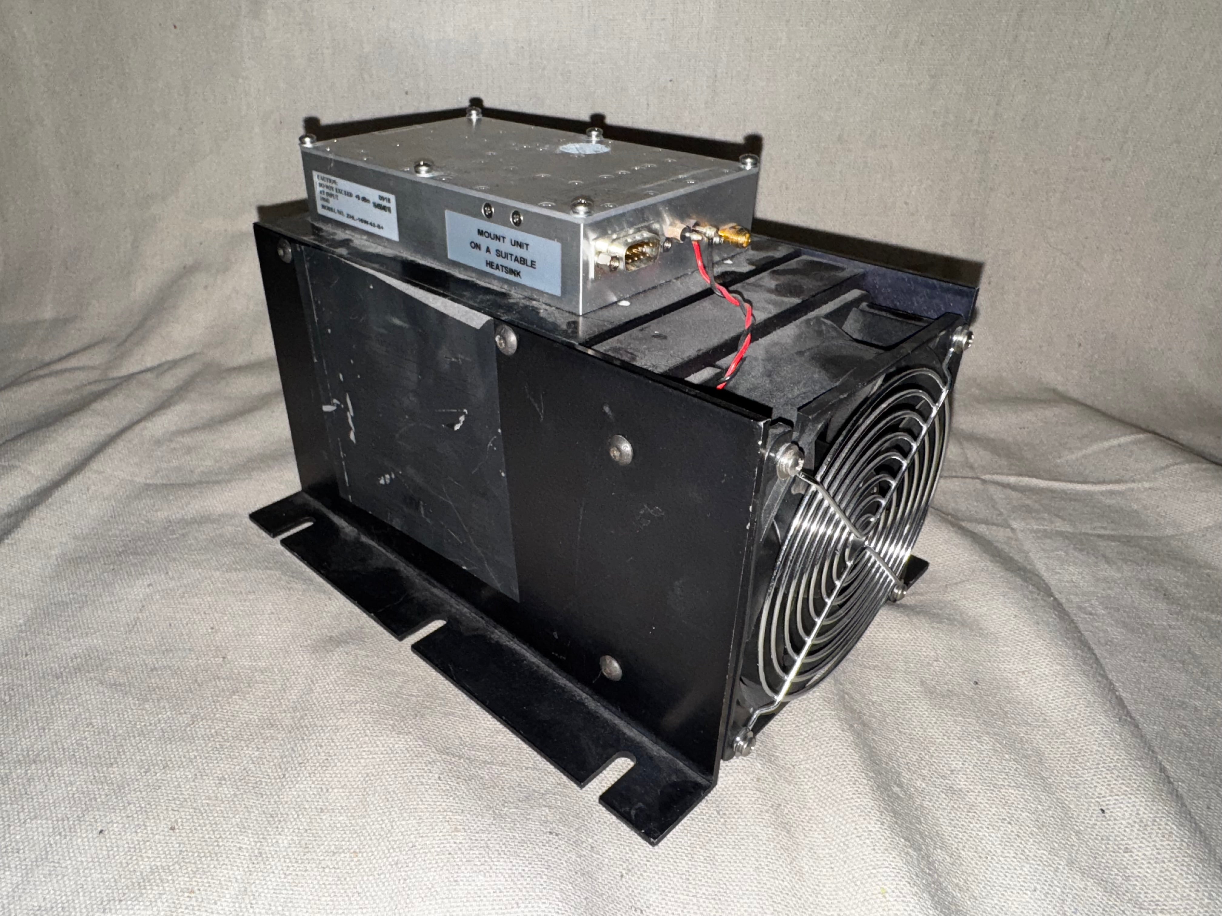 Mini-Circuits ZHL-16W-43-S+ For Parts - Non Functional unit showing back with a fan and circuit board.