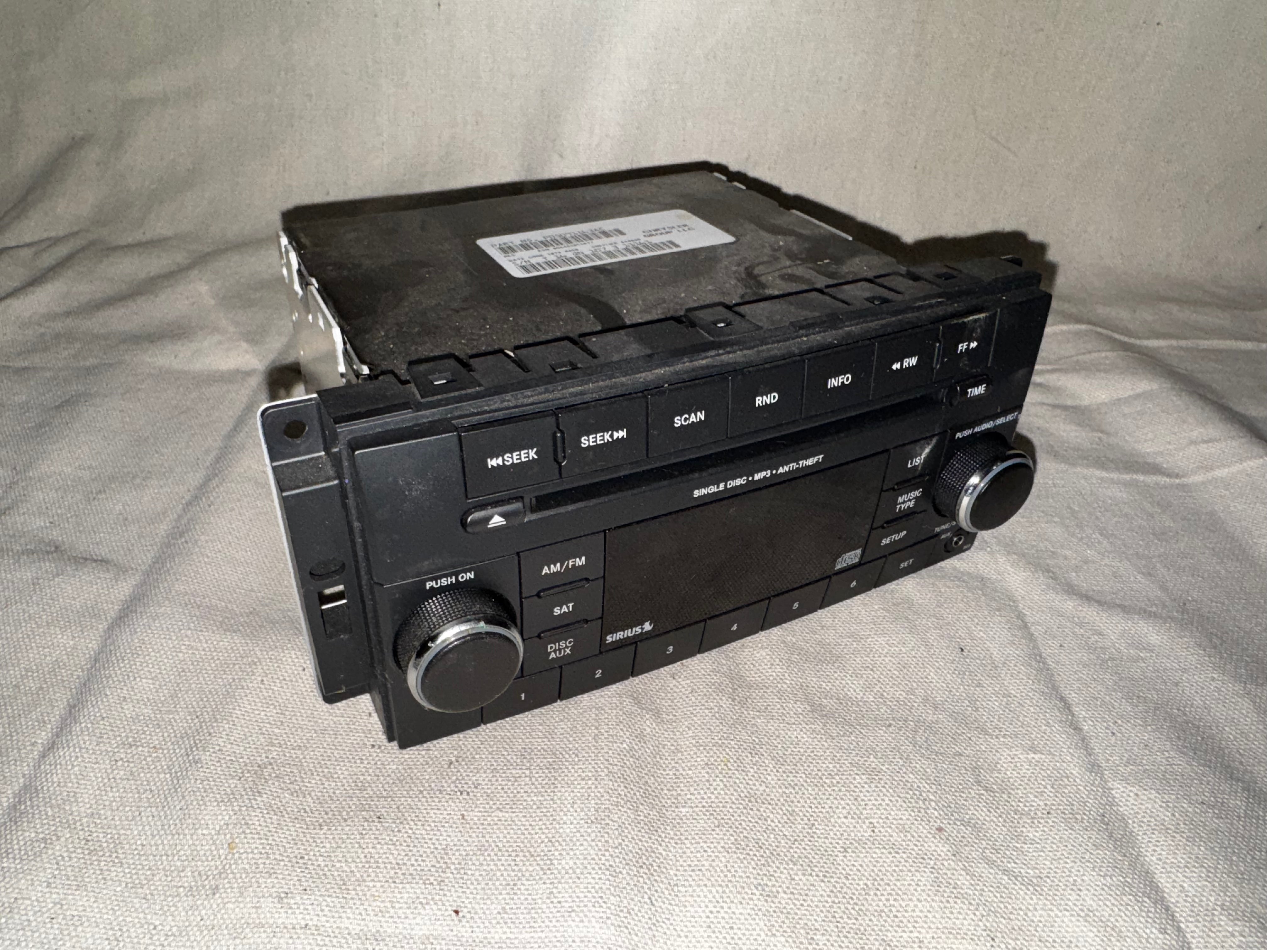 2007-2012 Jeep Dodge Chrysler OEM Radio AM FM MP3 CD Player Sirius P05091198AC