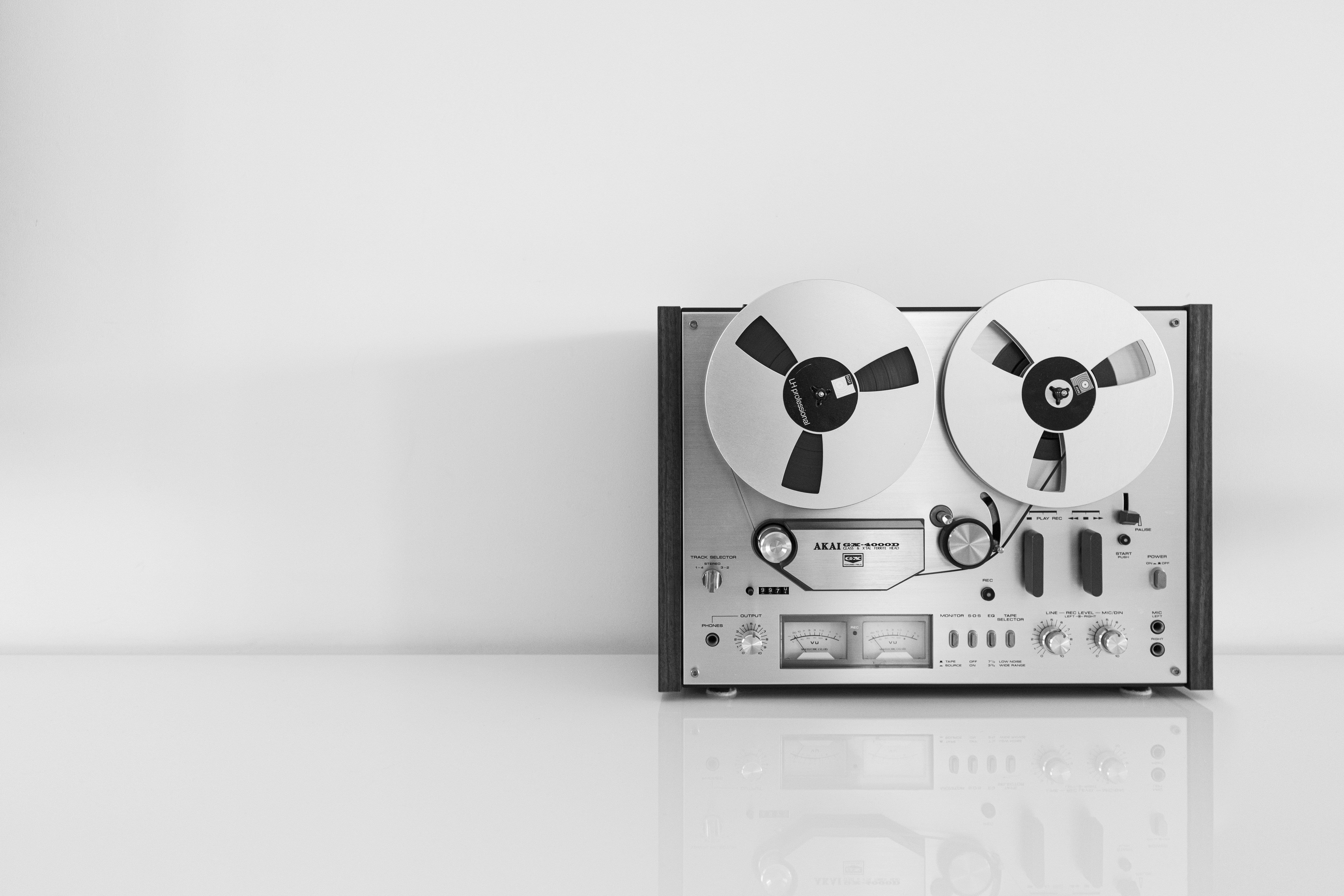 Reel to Reel and Open Tape Deck Repair Service Estimate featuring a vintage reel-to-reel tape deck.